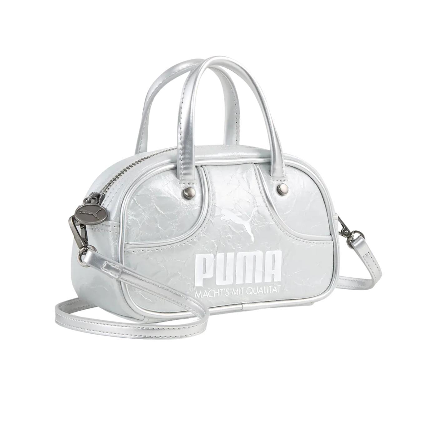 Bolso puma 1976 lustre micro plata de mujer.