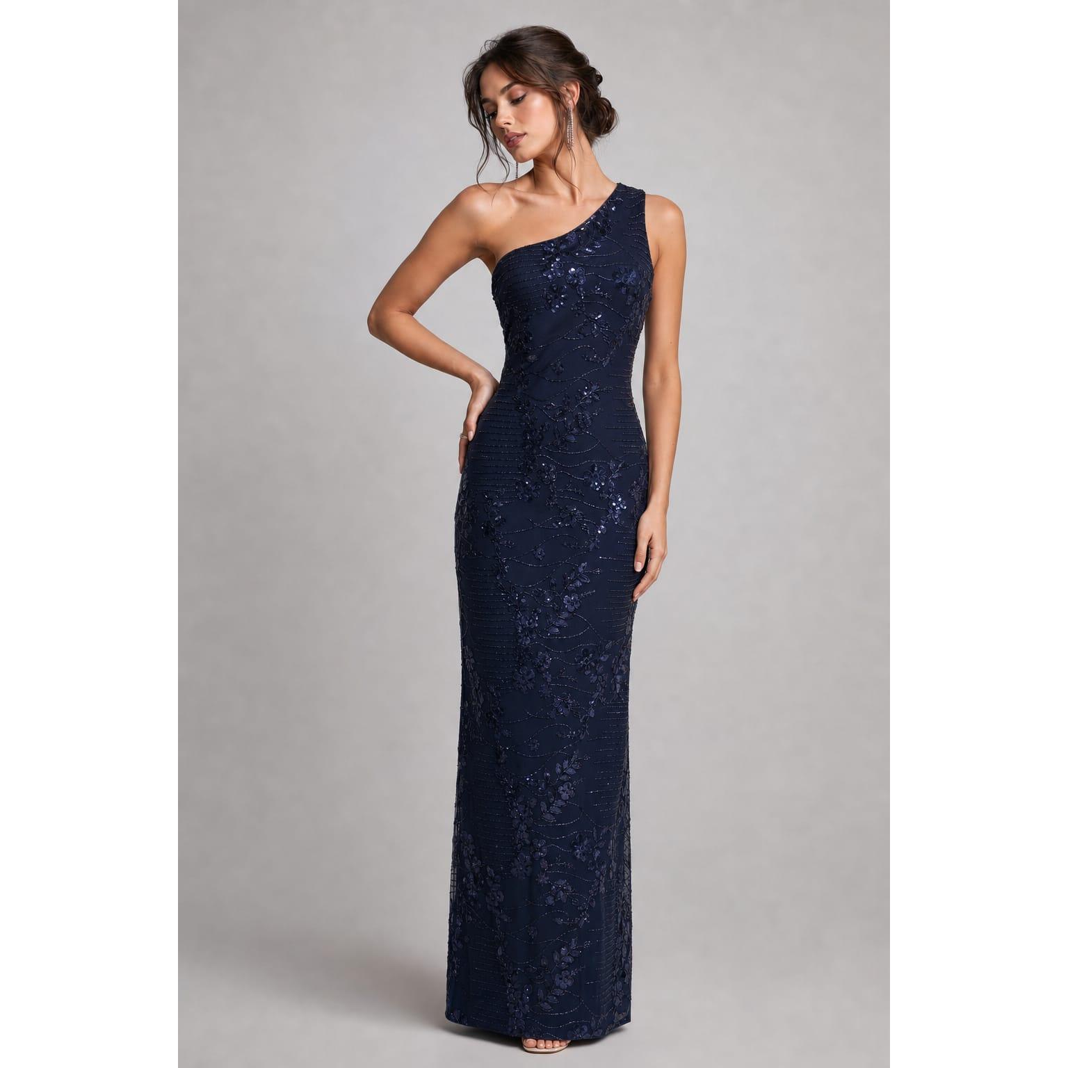 Vestido largo de fiesta asimétrico para mujer con pedrería y bordados florales. Diseño elegante y sofisticado ideal para bodas, galas y eventos especiales. Disponible en varios colores.