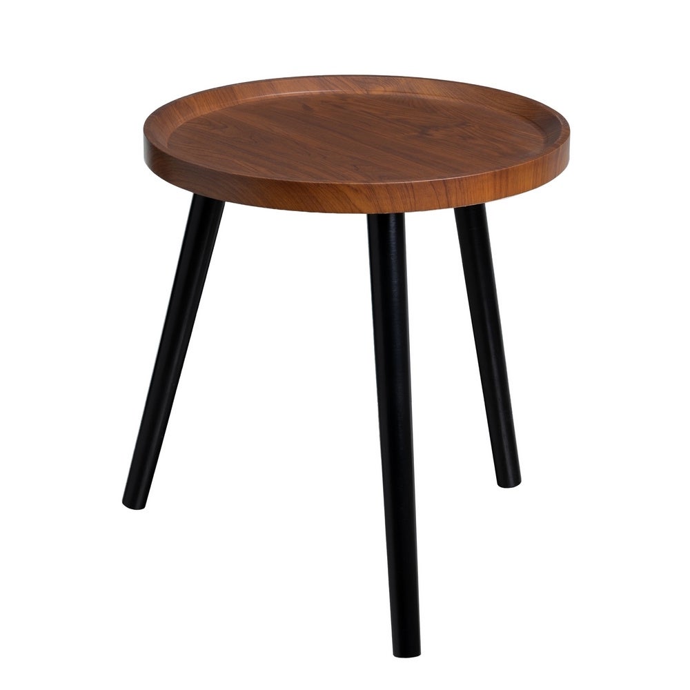 Mesita redonda de madera laminada en nogal con 3 patas negras 40x40x43 cm Madera laminada color nogal de 15mm. Diseño atemporal y versátil. Ideal junto al sofá o mesa de centro. Soporta 10kg. CasaSelección