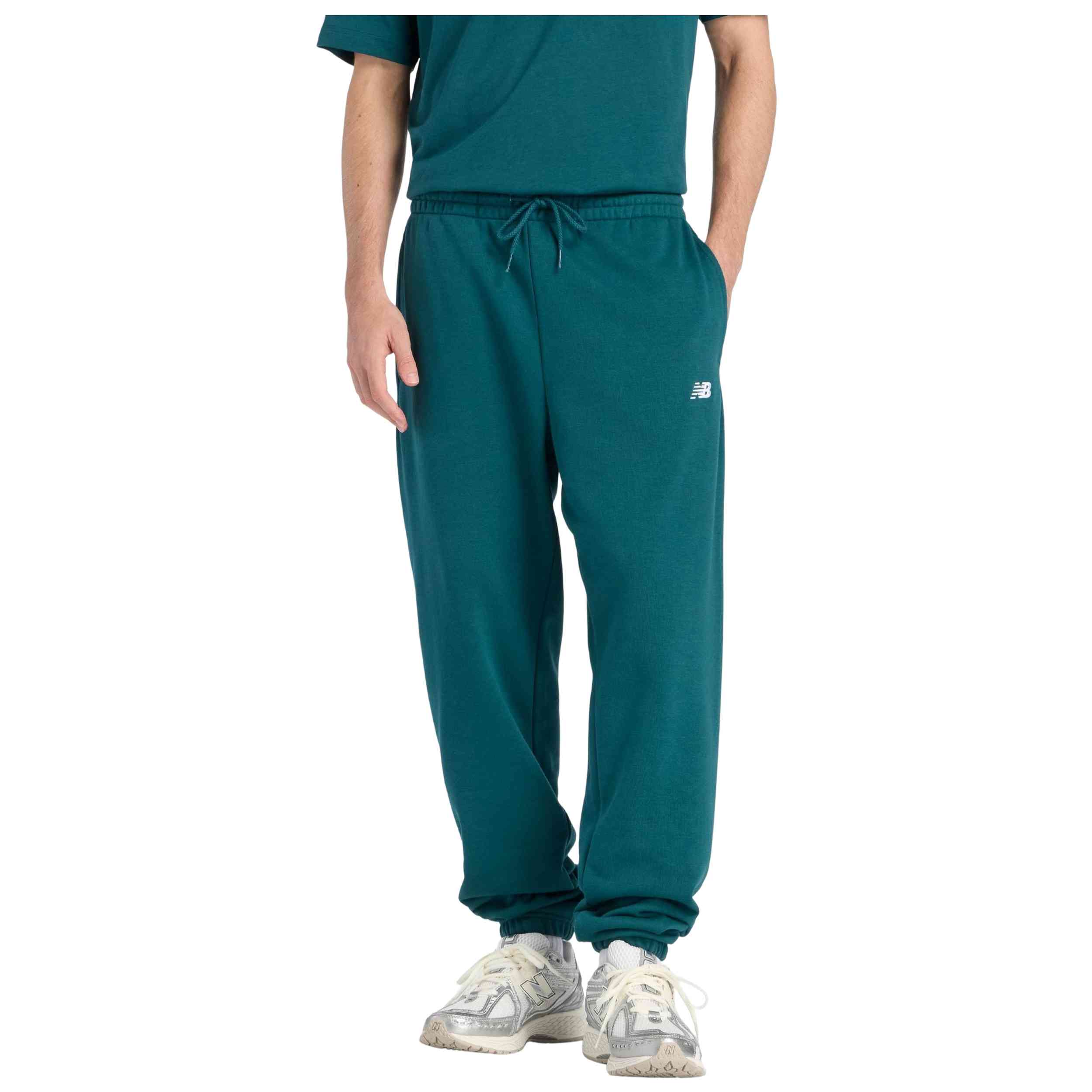 Sudadera New Balance modelo Pantalón largo New Balance Sport Essentials French Terry azul turquesa para hombre y mujer en color Verde