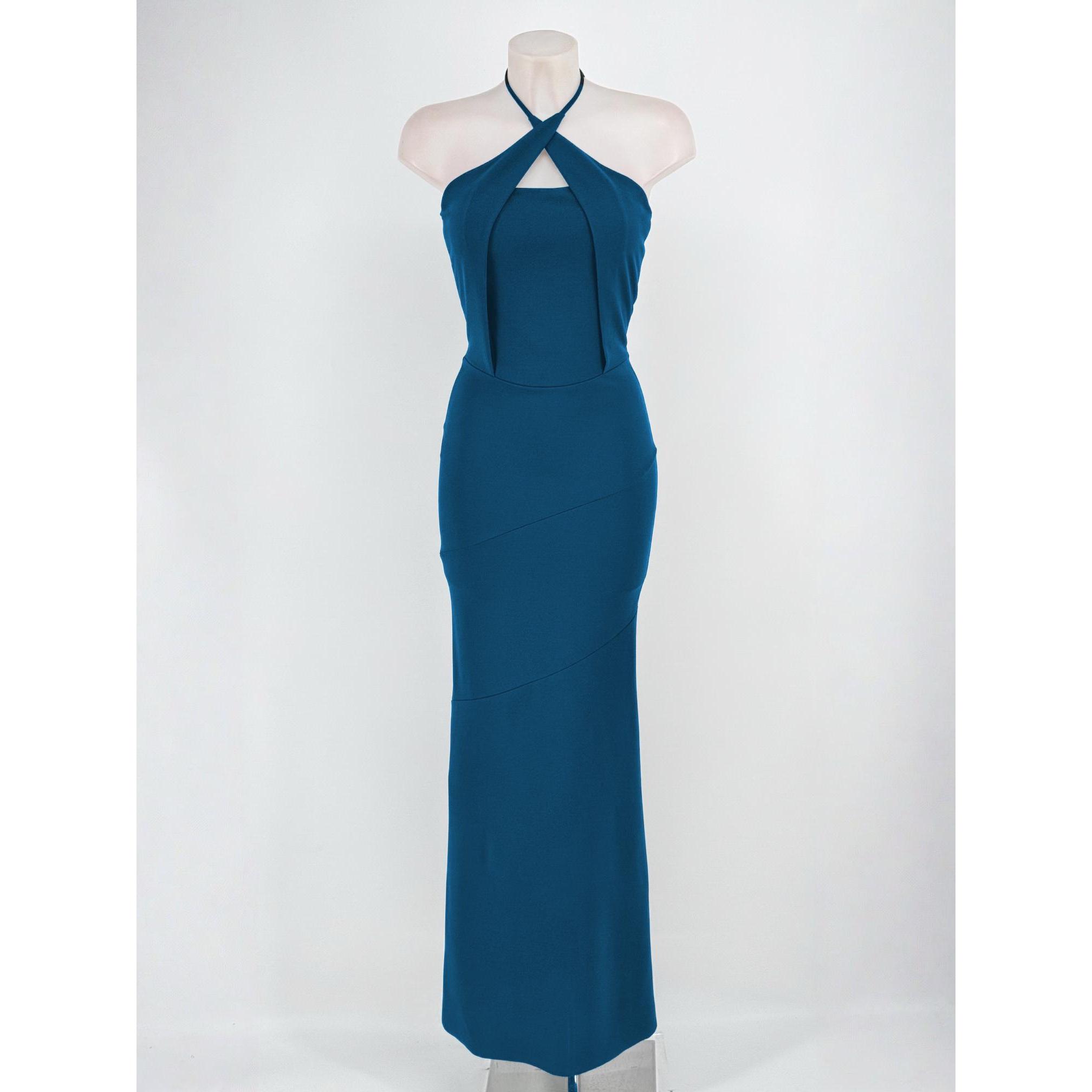 Descubre el vestido largo de fiesta ideal para bodas y eventos. Confeccionado en tejido scuba crepe de alta calidad, destaca por su elegante escote halter cruzado con apertura y espalda descubierta. Diseño entallado y favorecedor (talla única 34-38).