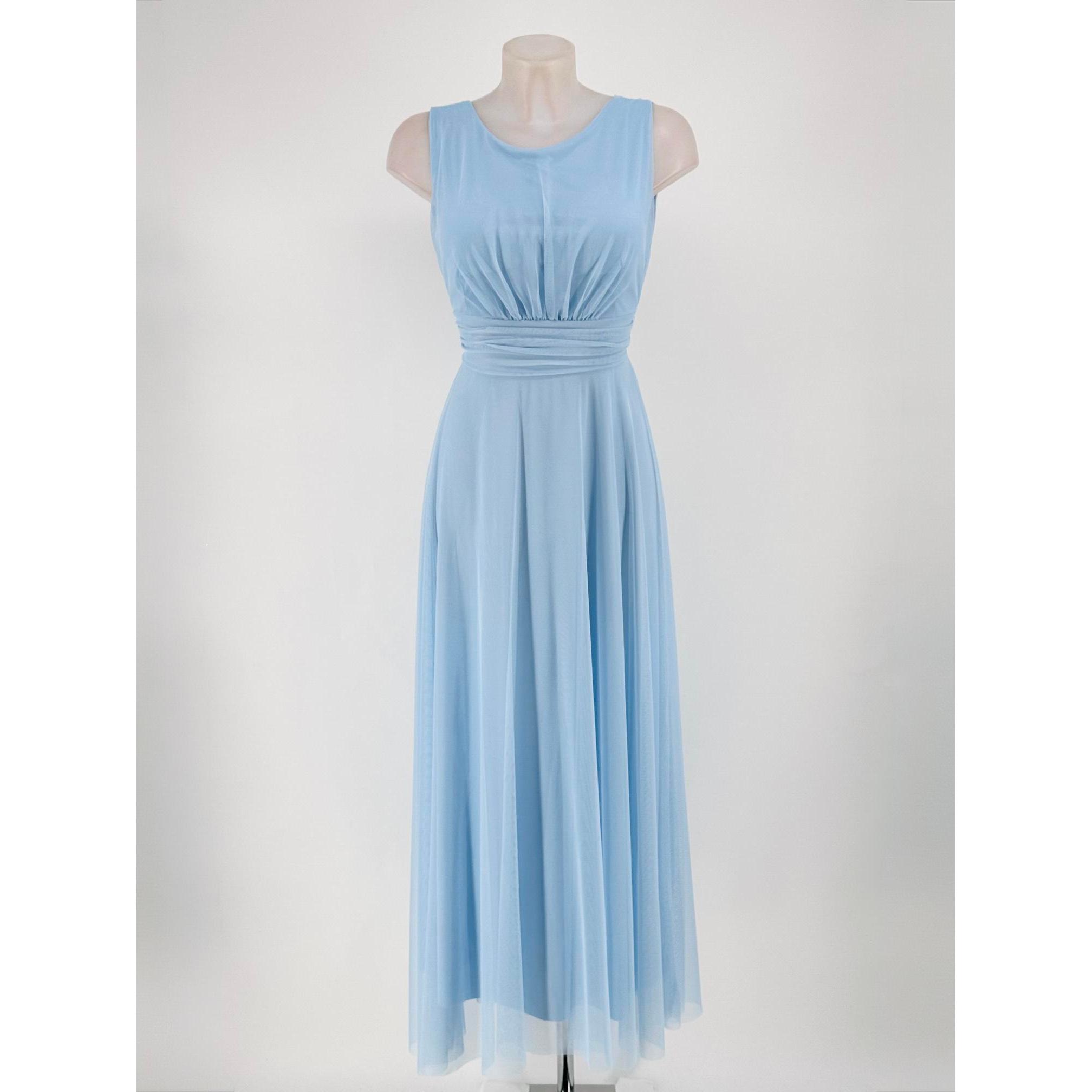 Vestido de tul con forro interior y escote redondo sin mangas. Con goma en la cintura y fruncido en la misma. Lazada trasera de gasa, relleno en el pecho. Amplia gama de colores