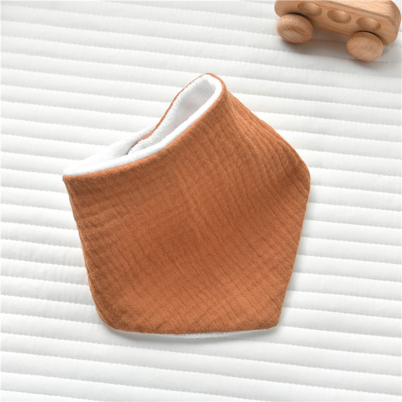CA Babero de tela de rizo crepé para recién nacidos de gran venta de INS para evitar que escupa leche con una capa impermeable de toalla triangular