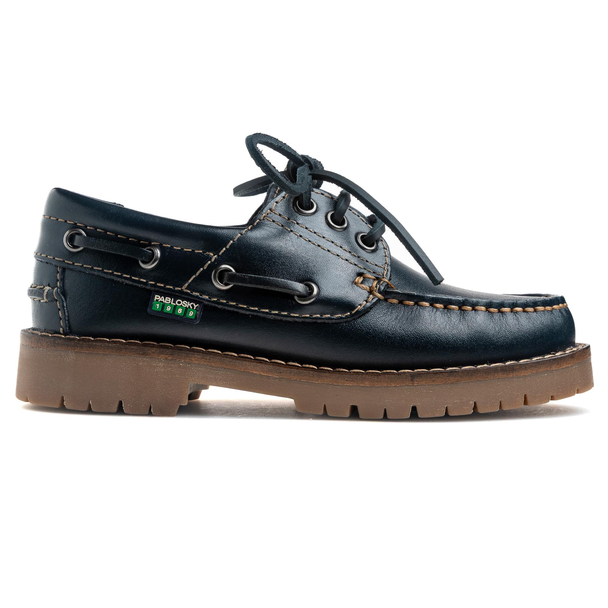 Pablosky - nauticos Nautic Pull 130020 para niño, de piel azul marino con cordones ajustables y suela de contraste
