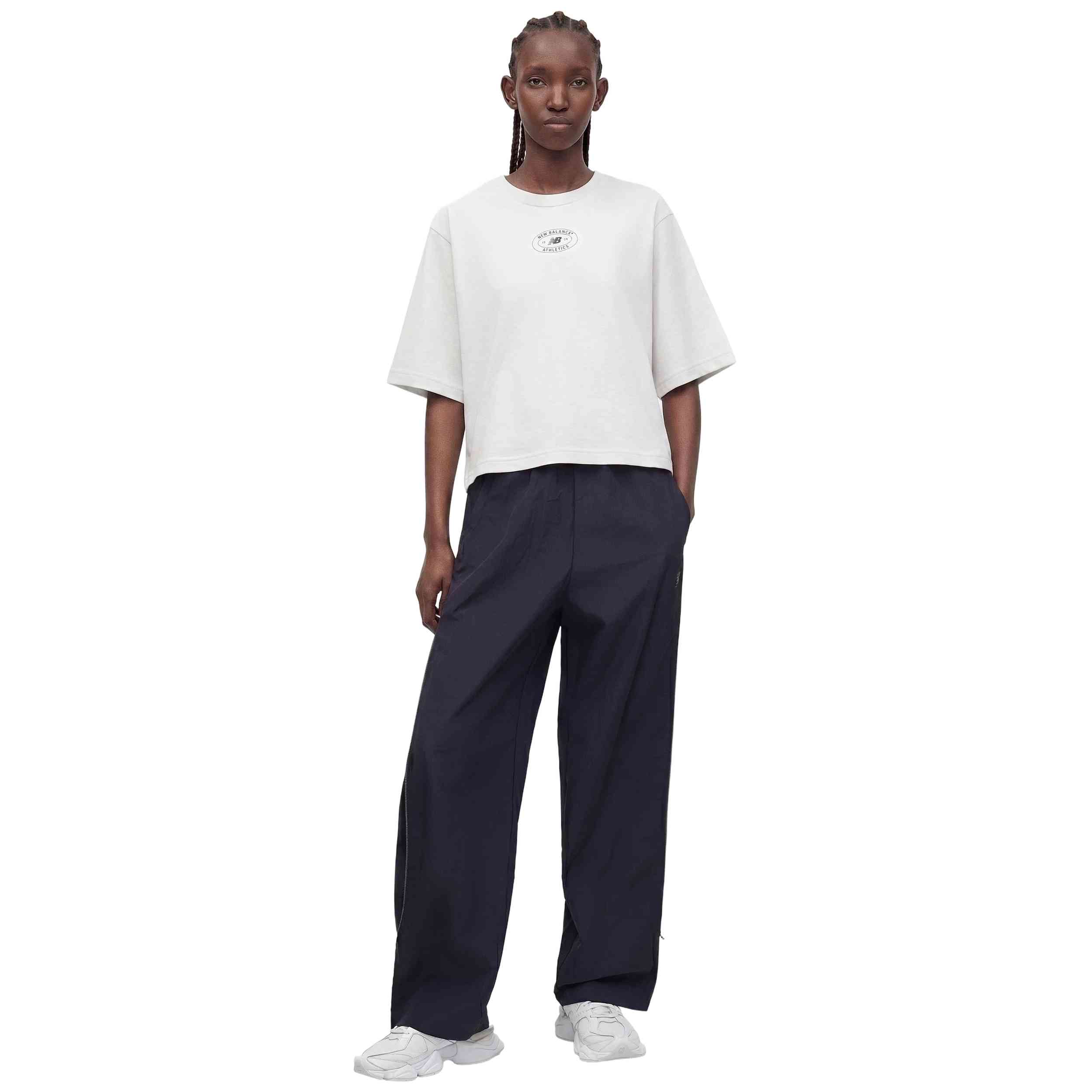 Pantalon Largo New Balance modelo Sport Legacy para hombre y mujer en color Azul