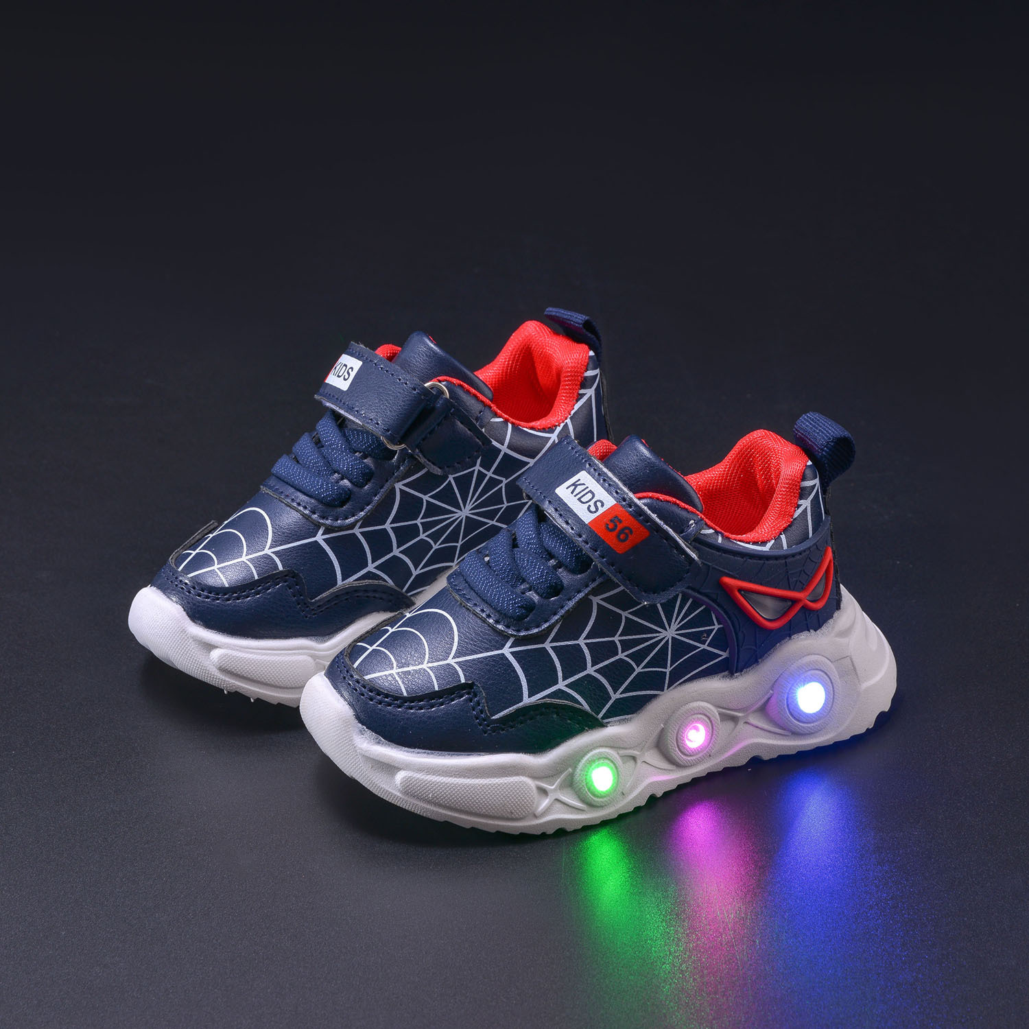 TK Nuevas zapatillas deportivas luminosas LED de telaraña de cuero para niños de primavera y otoño para niños pequeños y medianos. Zapatillas deportivas casuales.