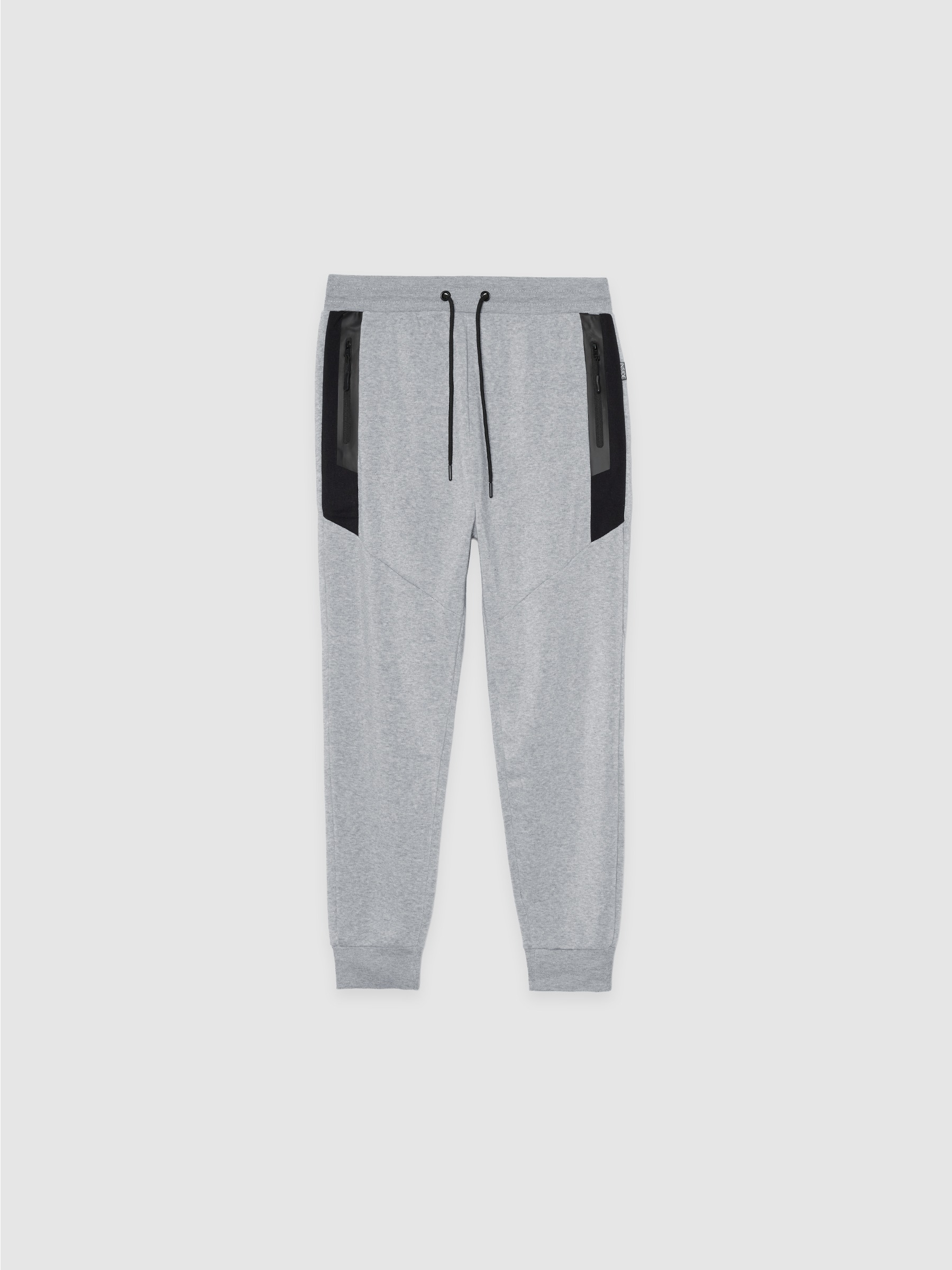 Pantalón jogger deportivo de felpa con bolsillos, cintura ajustable y acabados elásticos INSIDE