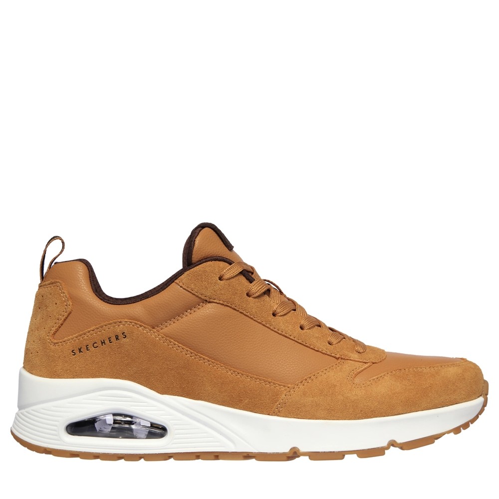 Cómoda Zapatilla hombre estilo running clásico Skechers UNO - STACRE de suave ante y de malla marrones. Plantilla Memory Foam. Suela con cámara de aire amortiguadora. Altura Tacón bajo (1-3 cm) Referencia 52468-WSK