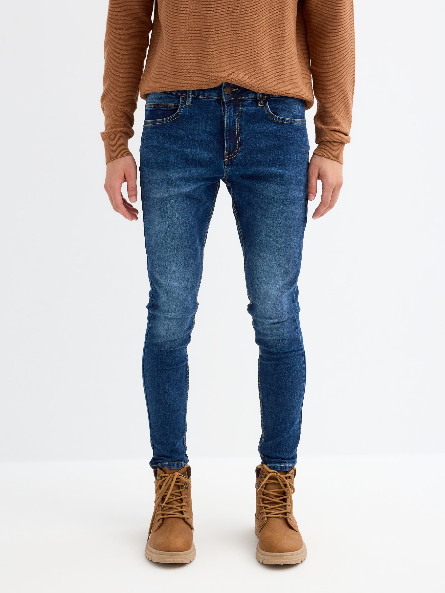 Jeans skinny de tejido denim oscuros desgastados de tiro medio con bolsillos y cierre de cremallera con botón INSIDE