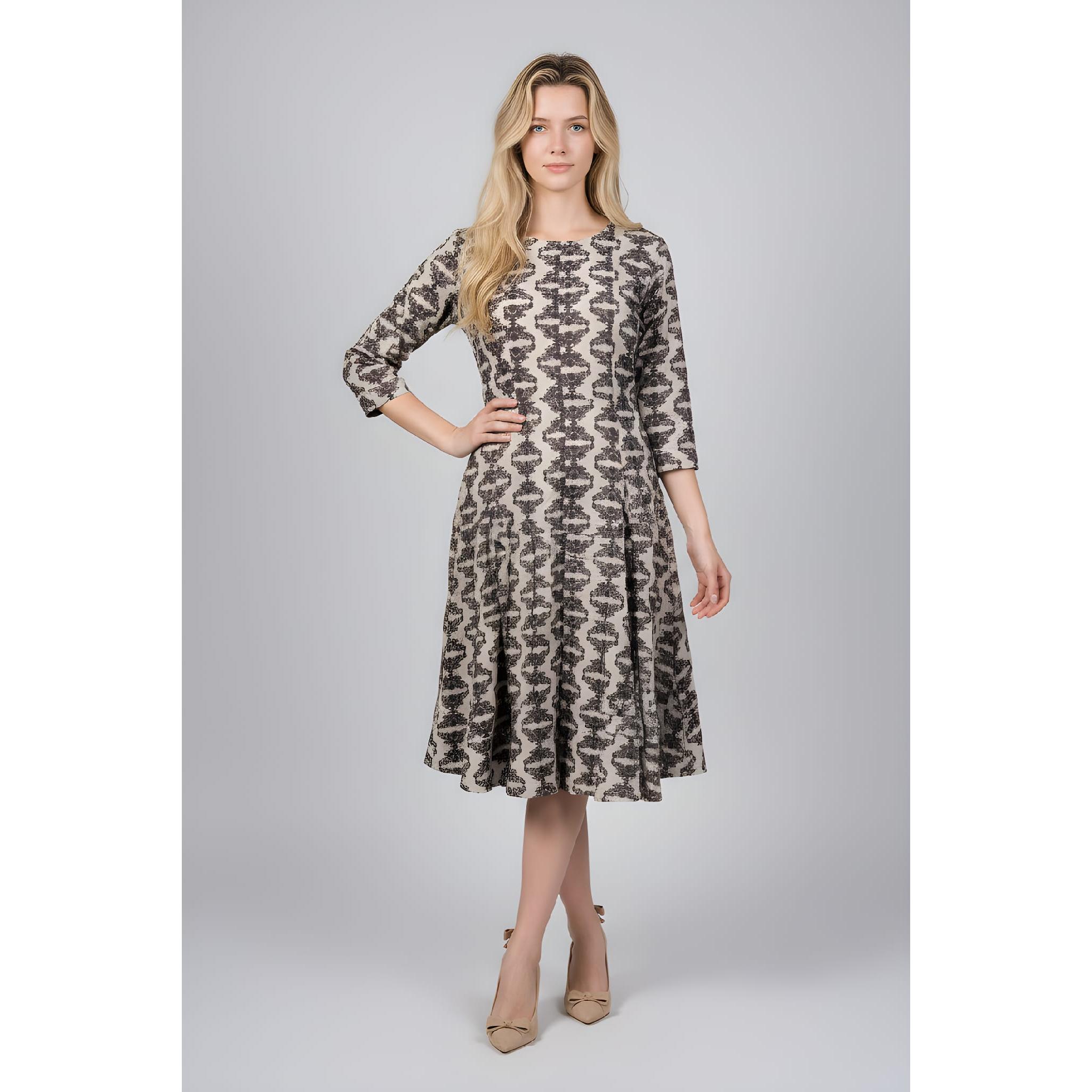 Descubre nuestro vestido midi 100% algodón con un diseño estampado vibrante, falda con vuelo y manga 3/4. Comodidad y estilo garantizados. Imprescindible- REF;: D334