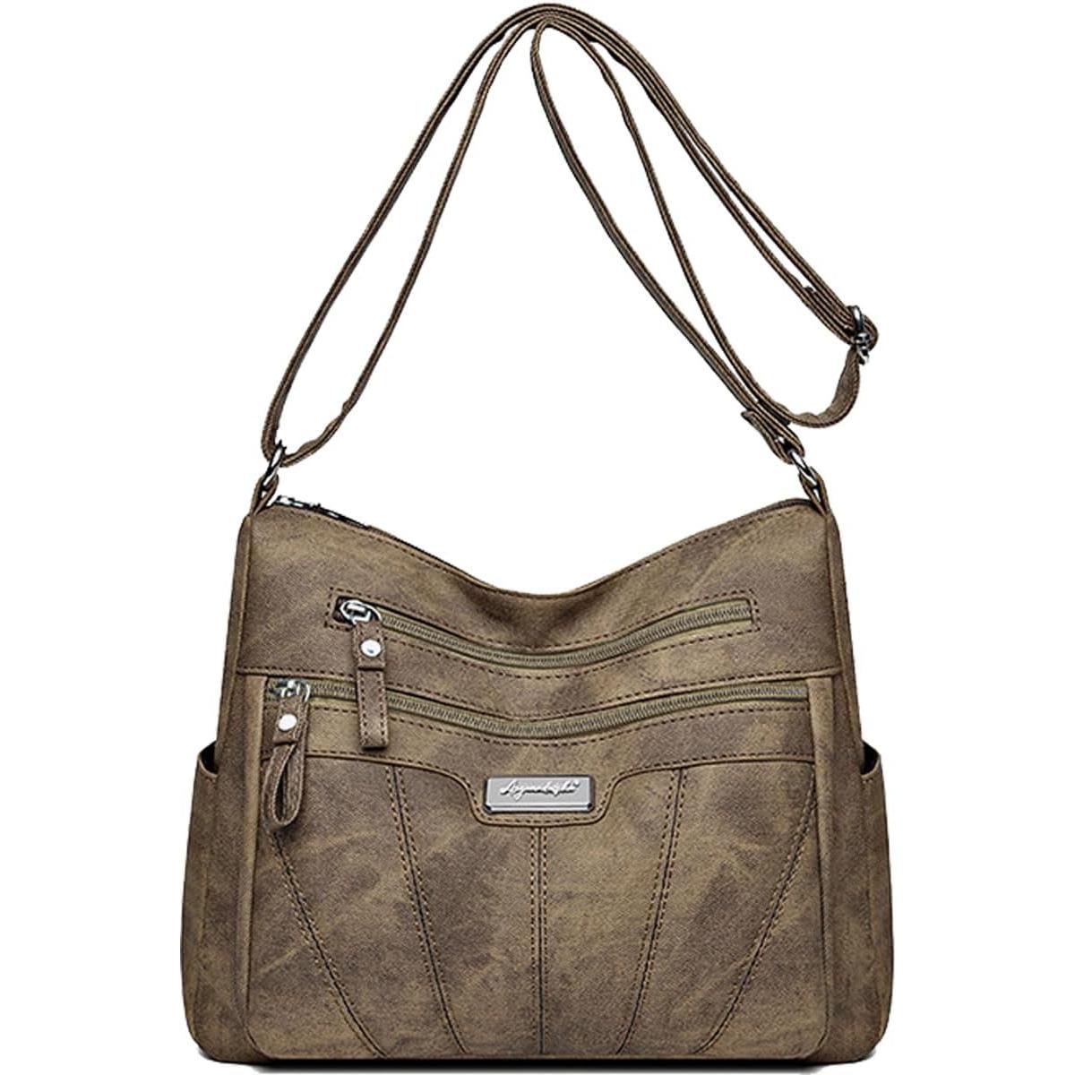 Bolso de hombro de piel para mujer con cremallera y múltiples bolsillos; se puede llevar al hombro o cruzado.