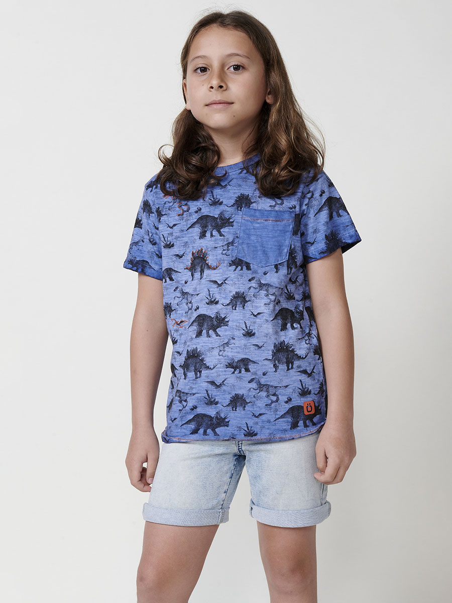 Koroshi - Camiseta niño manga corta con estampado all-over de dinosaurios, bolsillo de pecho y logo Koroshi, 95% algodón y 5% elastano, color azul