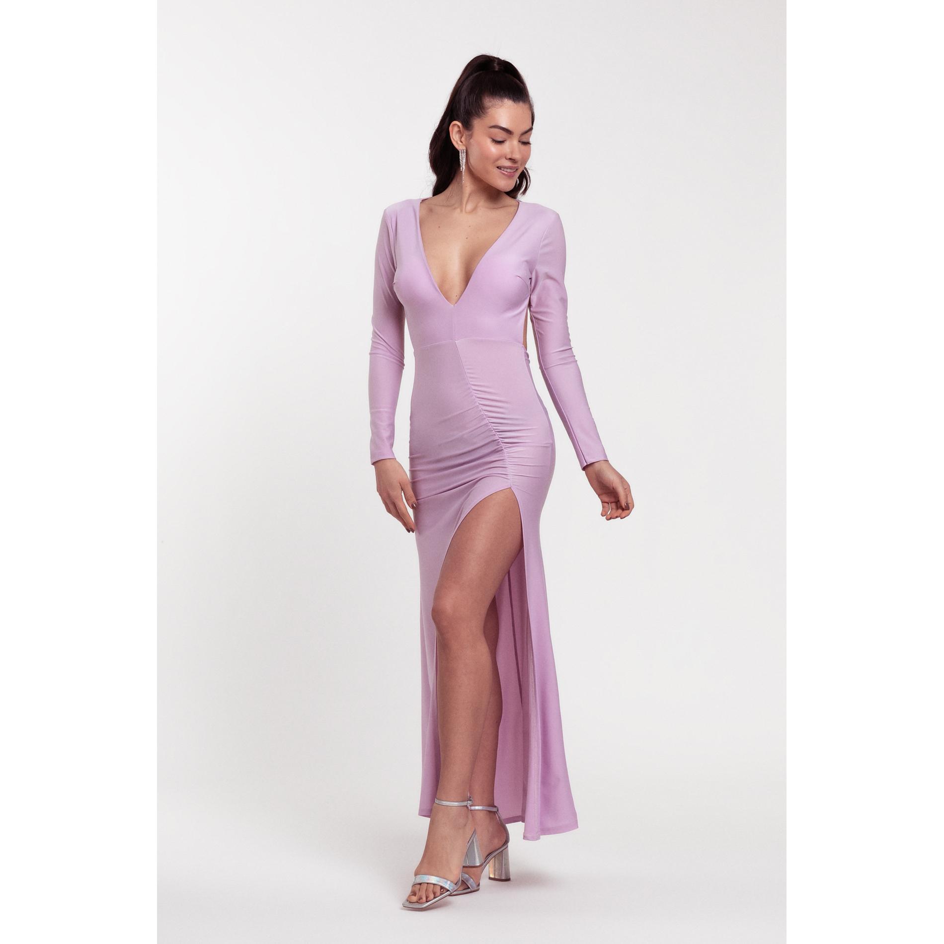 Vestido largo de fiesta en tejido elástico adaptable. Diseño espectacular con escote en V pronunciado, manga larga, espalda abierta ovalada, fruncido diagonal estilizador y alta abertura en la pierna. Talla única (34 a 38). ¡Deslumbra en tu próximo evento