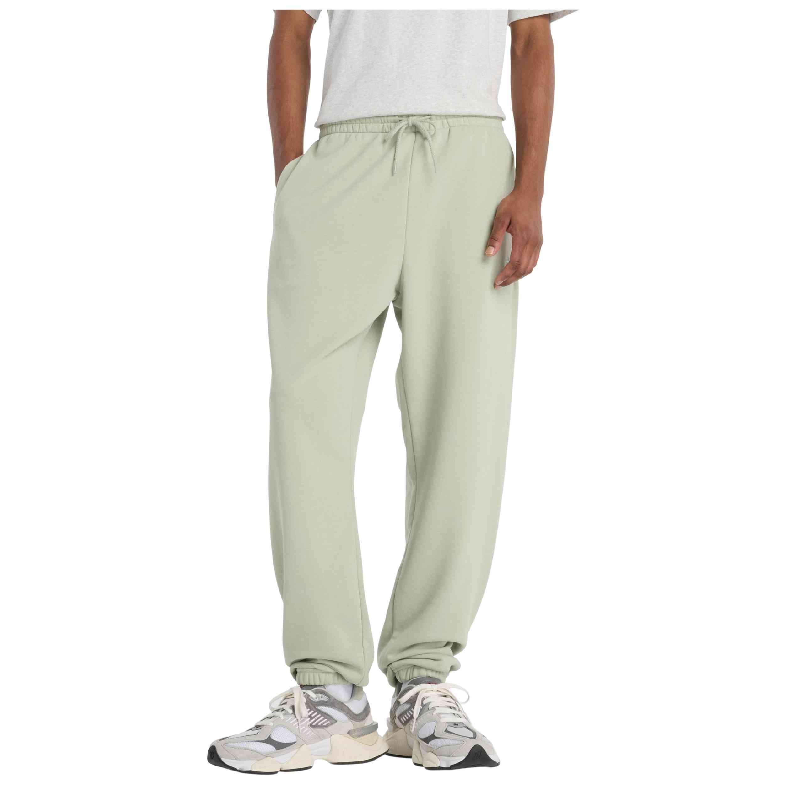 Pantalon De Chandal New Balance modelo Pantalón largo New Balance Sport Essentials French Terry verde menta para hombre y mujer en color Verde