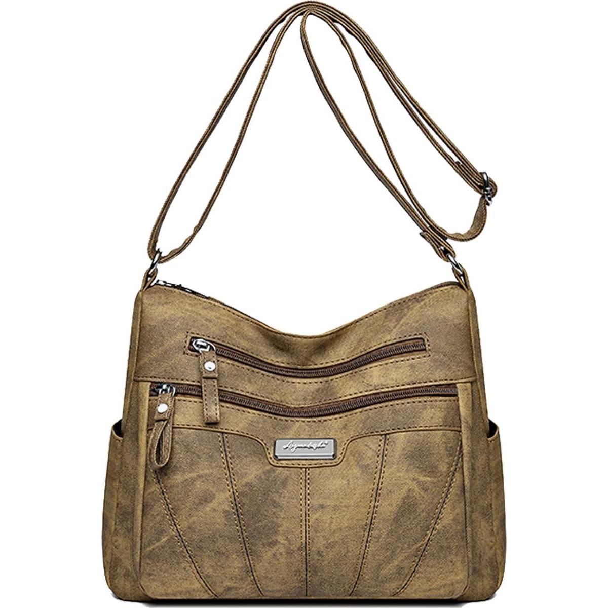Bolso de hombro de piel para mujer con cremallera y múltiples bolsillos; se puede llevar al hombro o cruzado.