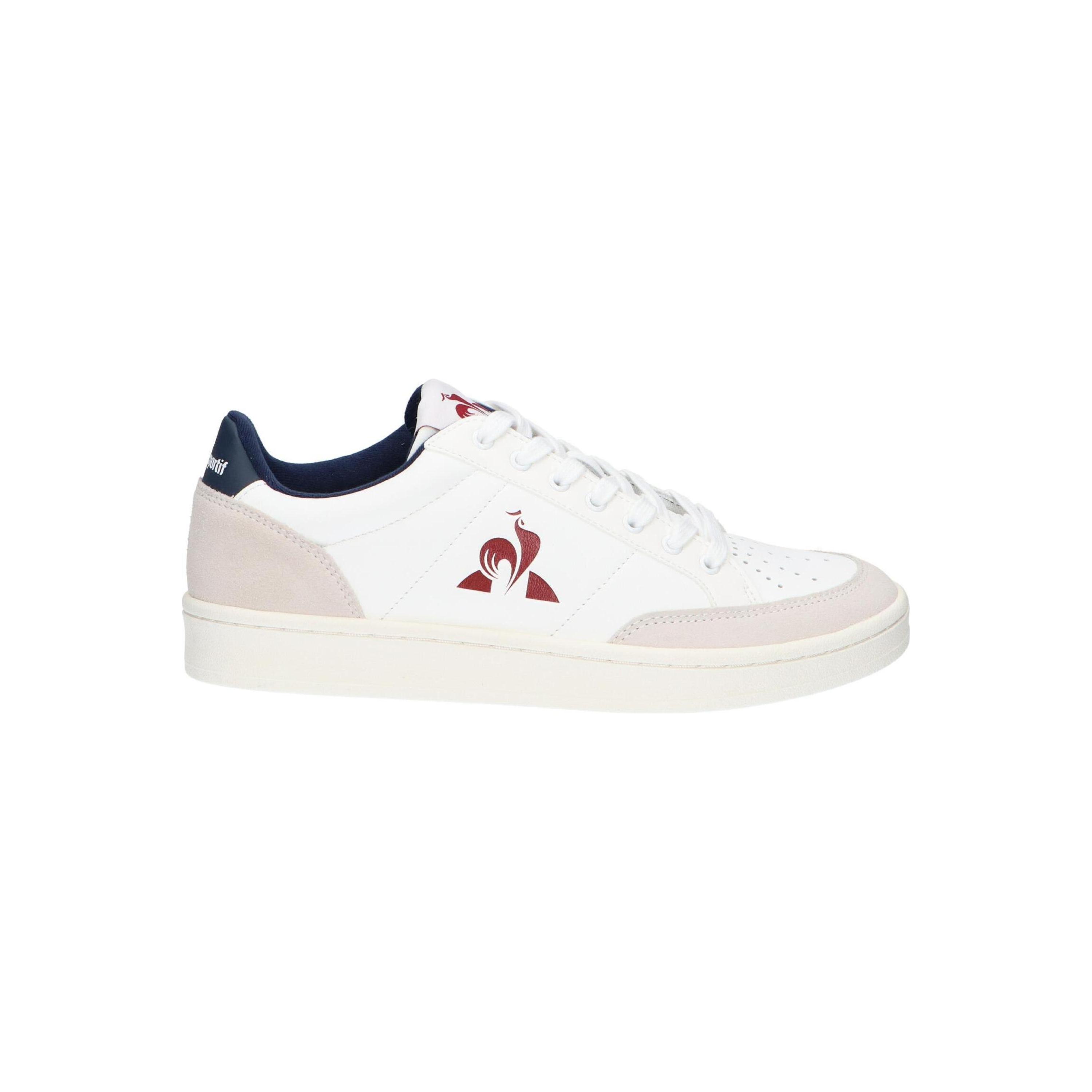 White casual sneakers for men Le coq sportif made of leather with textile lining, rubber sole, and closed toe; comfortable and breathable footwear ideal for sports and walking.