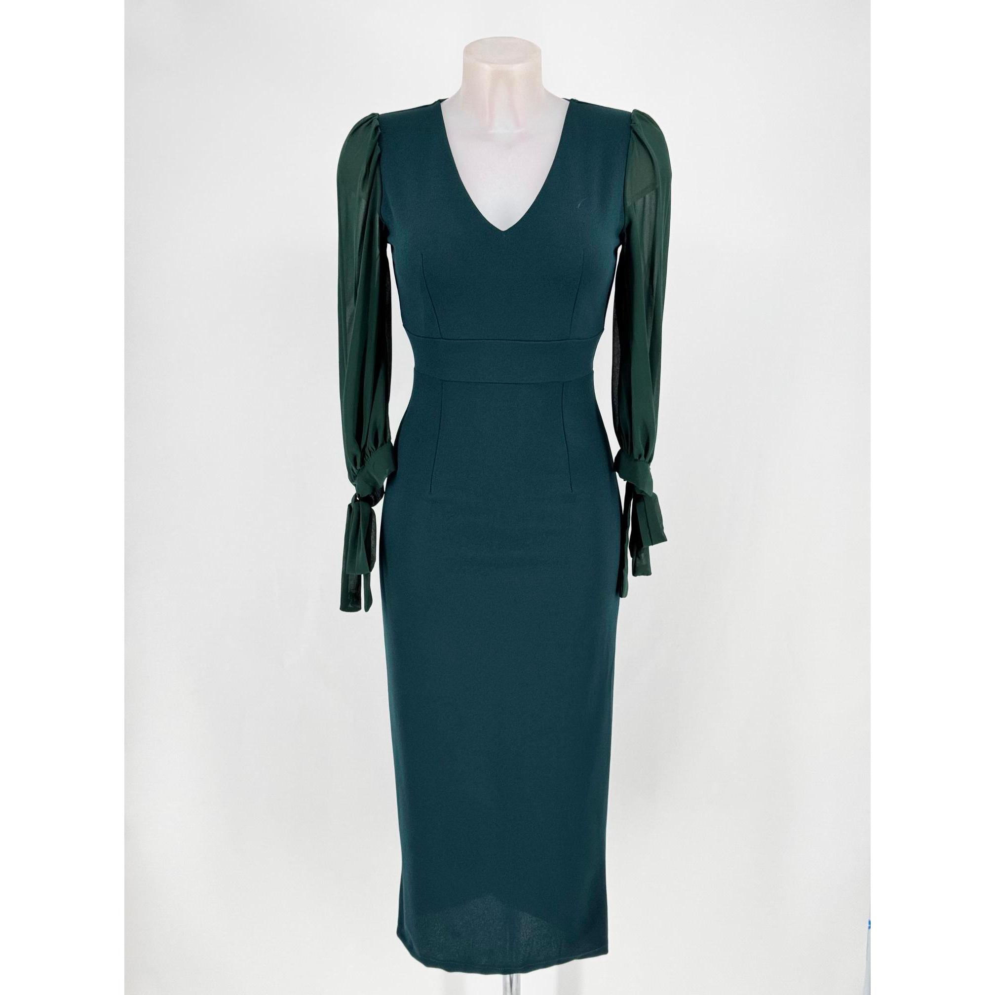 Vestido midi de fiesta para mujer en tejido scuba crep con favorecedor escote en V y refinadas mangas abullonadas de gasa semi-transparente rematadas con elegantes lazos. Diseño entallado con abertura trasera, disponible en varios colores y tallas.