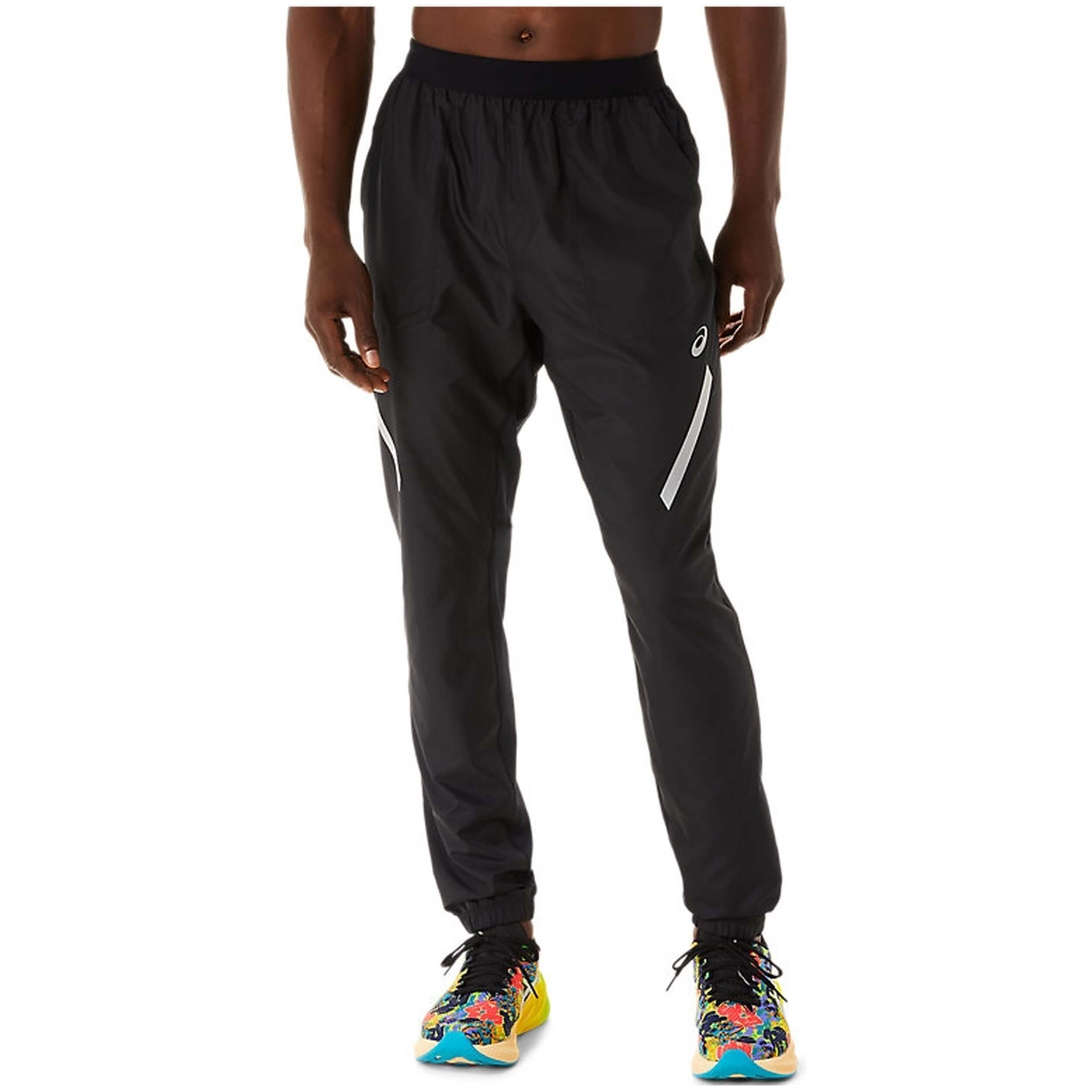 Pantalones Largos Asics modelo 2011C754-001 para HOMBRE en color Negro