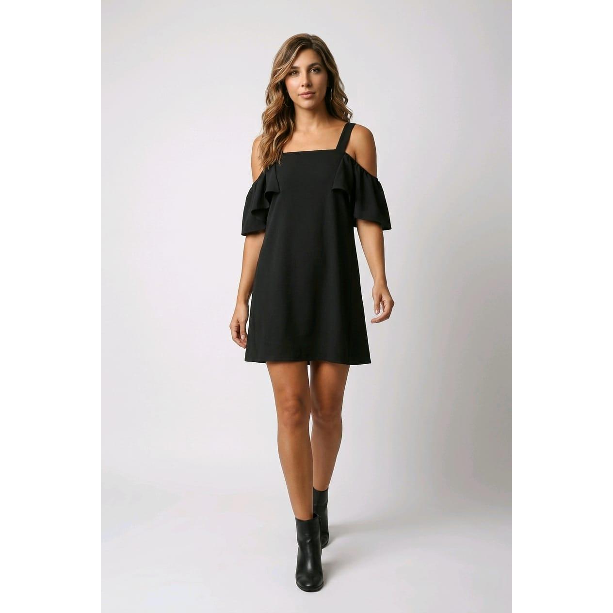 Vestido elástico con hombros descubiertos, tirantes regulables y bajo con vuelo. Diseño femenino, cómodo y elegante para cualquier ocasión. - REF: 60535