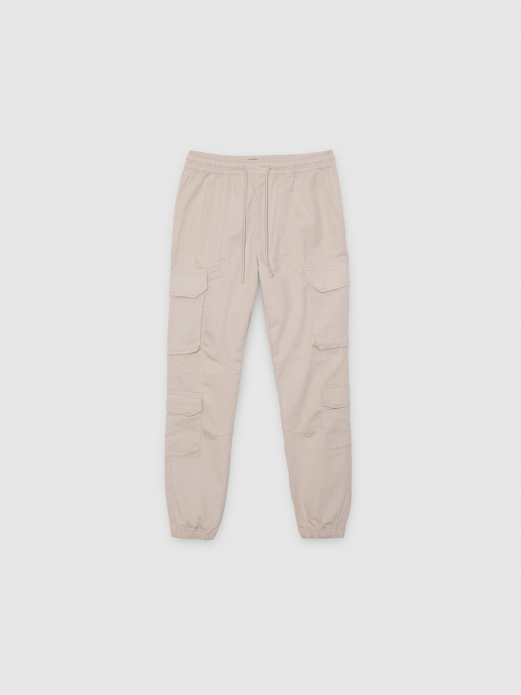 Pantalón jogger beige, cintura ajustable, bolsillos laterales, bajos elásticos INSIDE