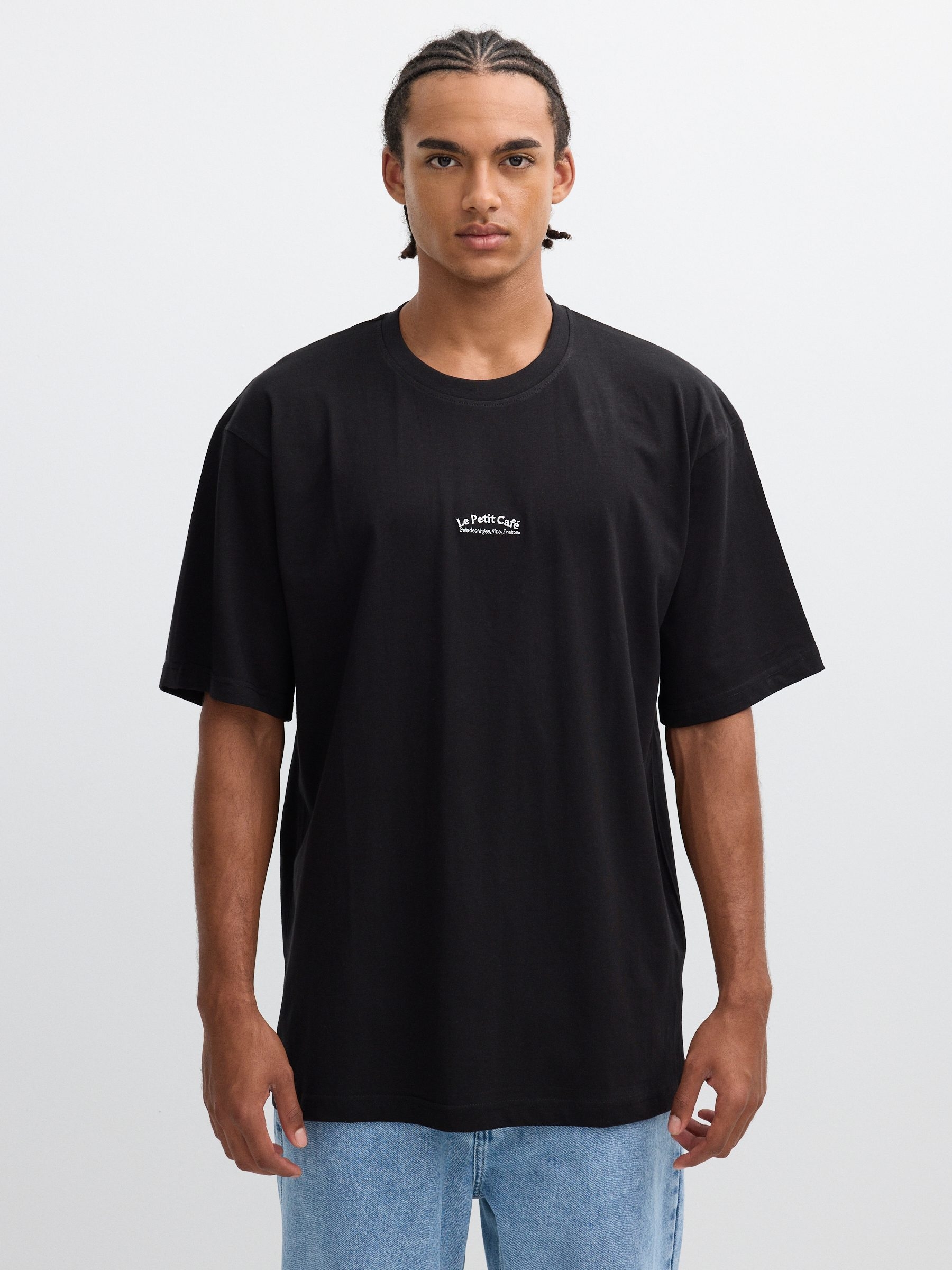 Camiseta oversized 100% algodón, manga corta, cuello redondo, diseño imagen y texto frontal y trasero INSIDE