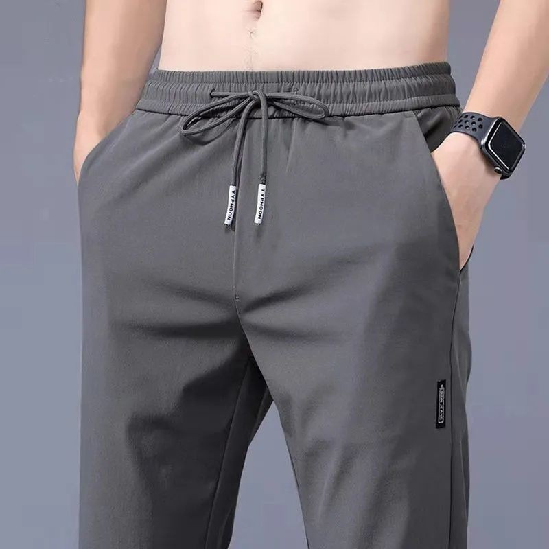 TK Pantalones Casuales Para Hombre De Seda Con Hielo 2024 Verano Nuevos En Negro Y Gris Mallas Elásticas Transpirables De Negocios Pantalones Rectos Para Exterior