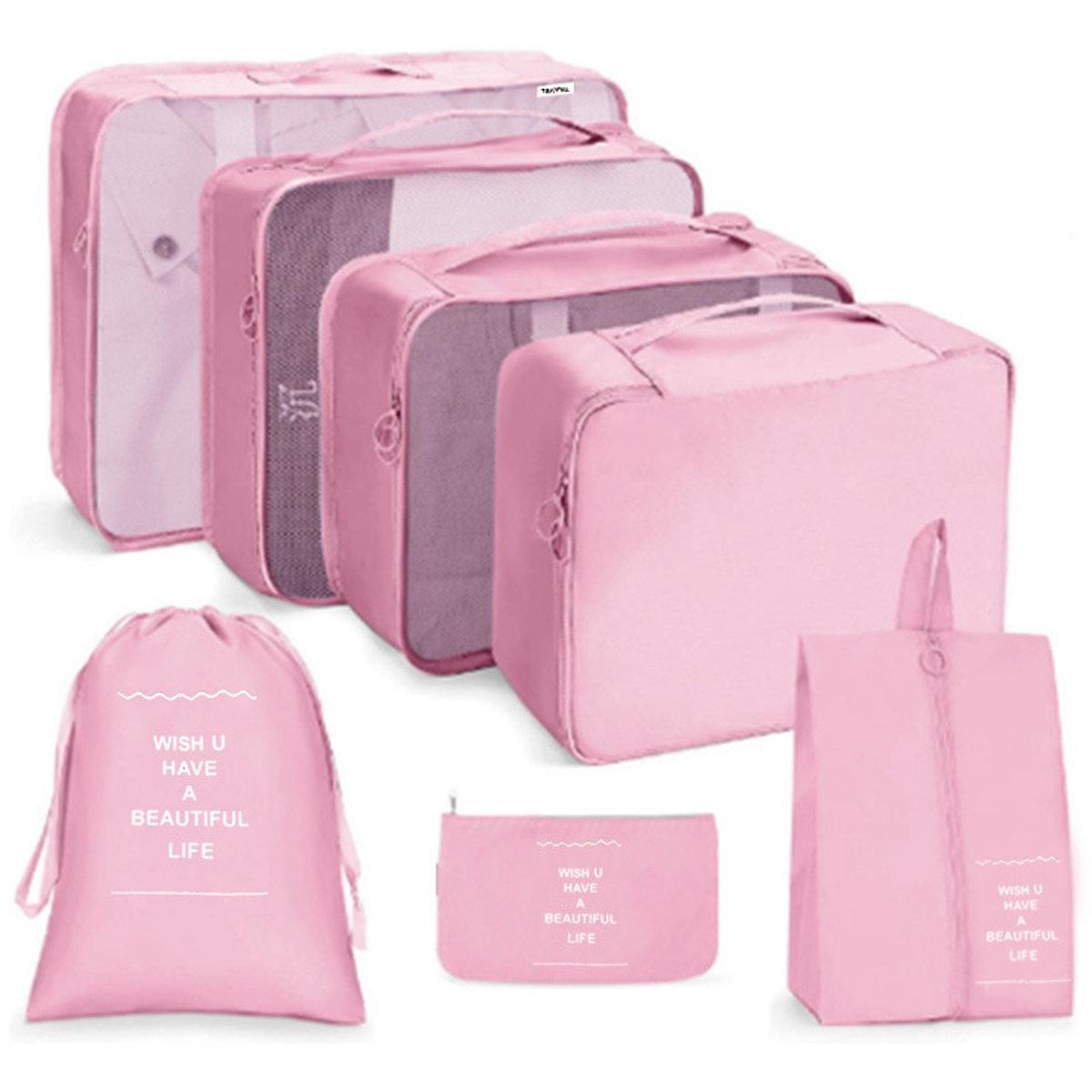 Een set van 7 opbergtassen in verschillende maten, een onmisbaar reisaccessoire, perfect voor het opbergen van koffers, kleding, ondergoed, schoenen en cosmetica. Verkrijgbaar in Roze.