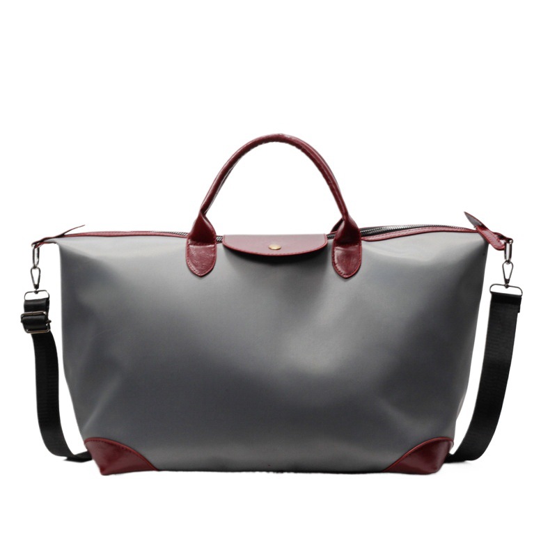 Bolso bandolera de gran capacidad, nuevo estilo 2026, bolso de viaje informal para viajes de negocios, bolso de tela para mujer, bolso de viaje versátil y sencillo para viajes cortos.