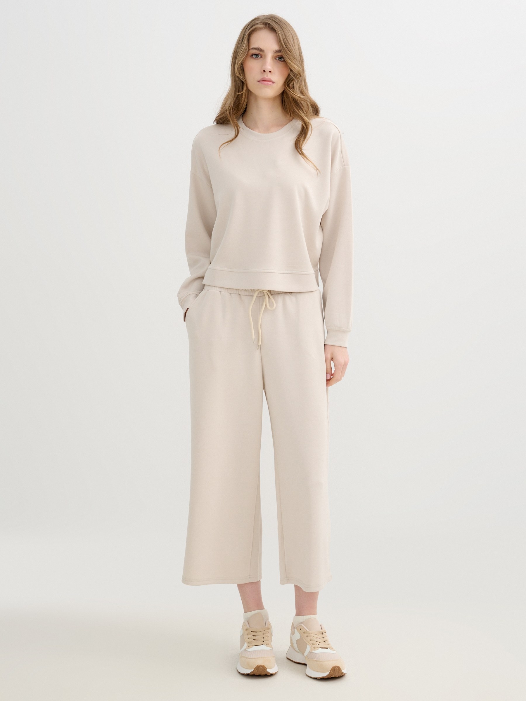 Pantalón culotte deportivo de punto, diseño liso, corte regular, tiro alto y cintura elástica INSIDE