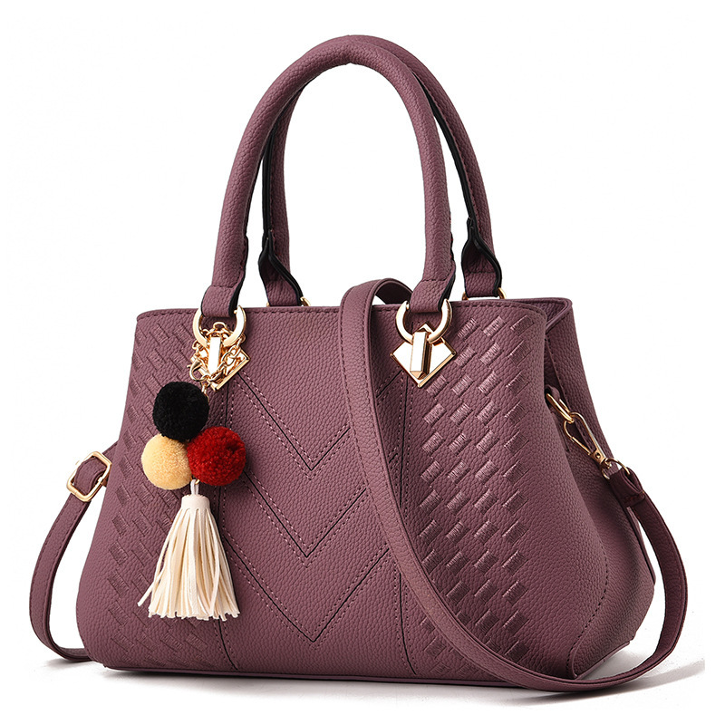 Bolso de mano para mujer, tipo bandolera con asa superior, decorado con pompones y borlas