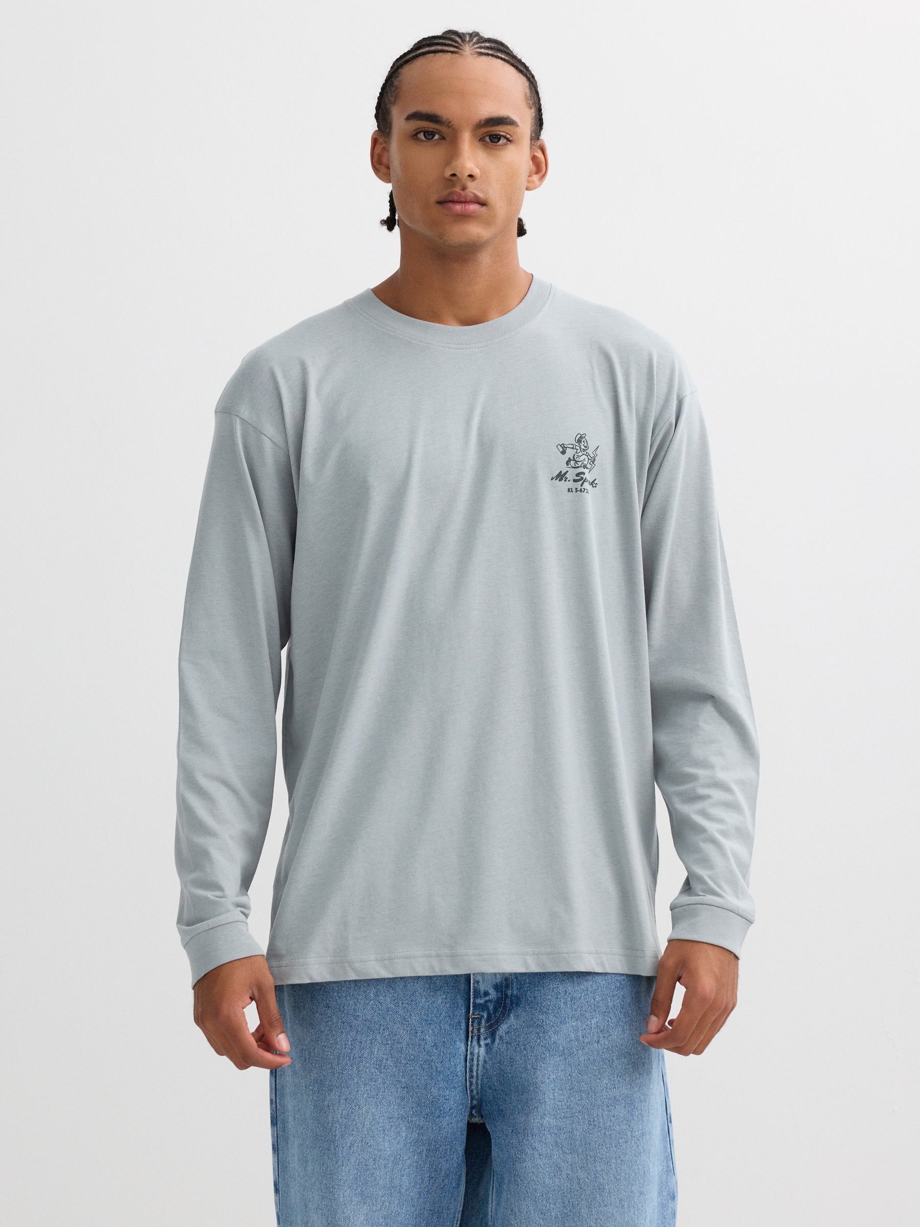 Camiseta oversized de algodón, manga larga, cuello redondo, diseño frontal y trasero, acabados en rib INSIDE