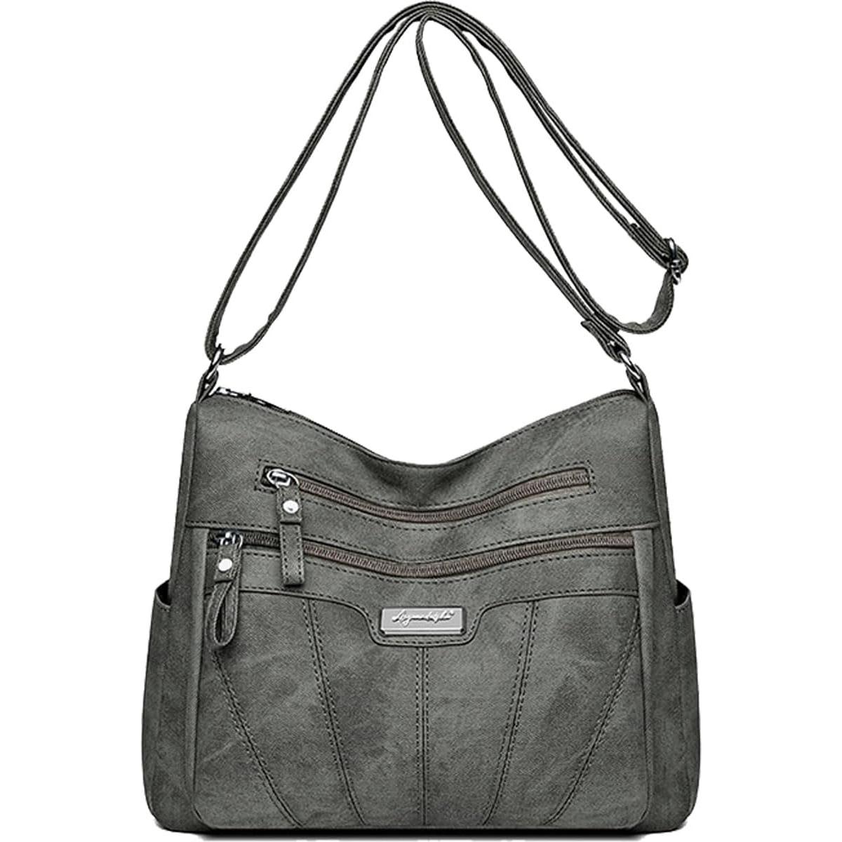 Bolso de hombro de piel para mujer con cremallera y múltiples bolsillos; se puede llevar al hombro o cruzado.