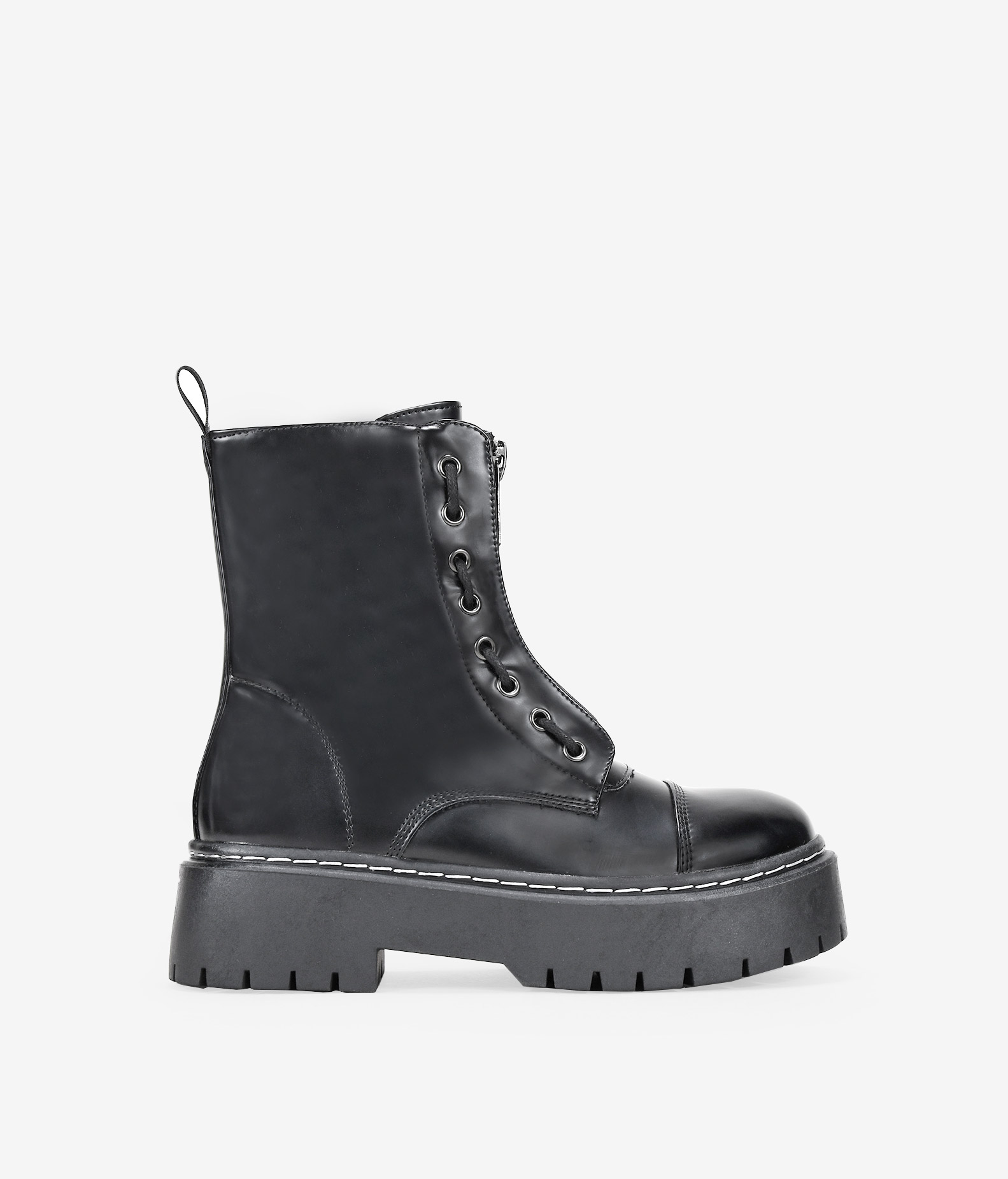 Bosanova Botas militares estilo punk con plataforma dentada y cordones hasta la parte superior. Cierre con cremallera.